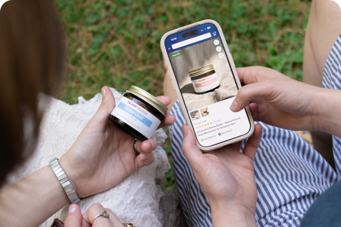 Shoppers comparing a product and the marketplace on a phone